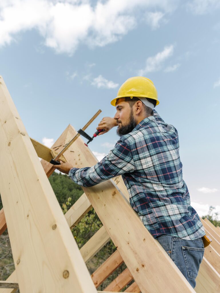 worker-with-hard-hat-building-roof-house